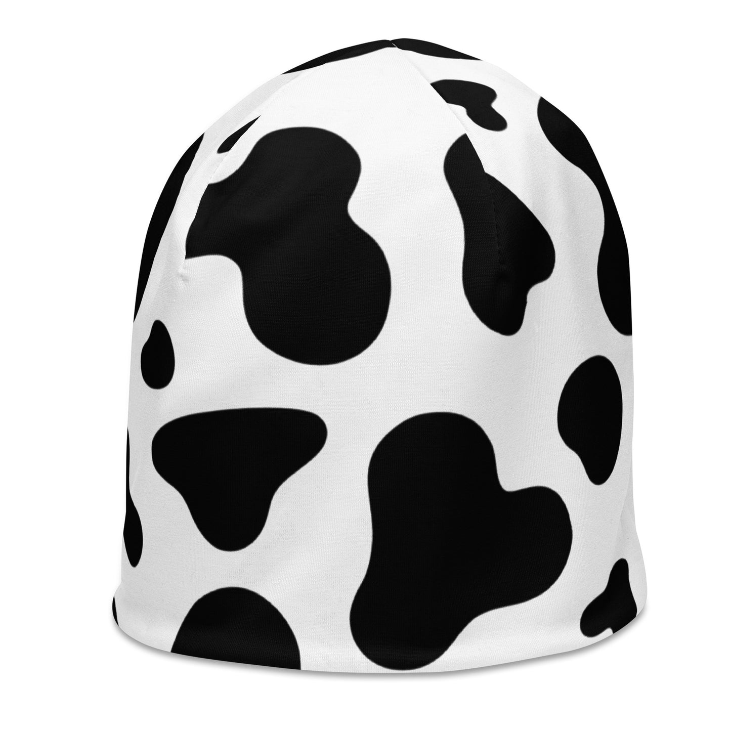 Unisex cow print beanie hat in black and white, soft double-layer knit, left side view