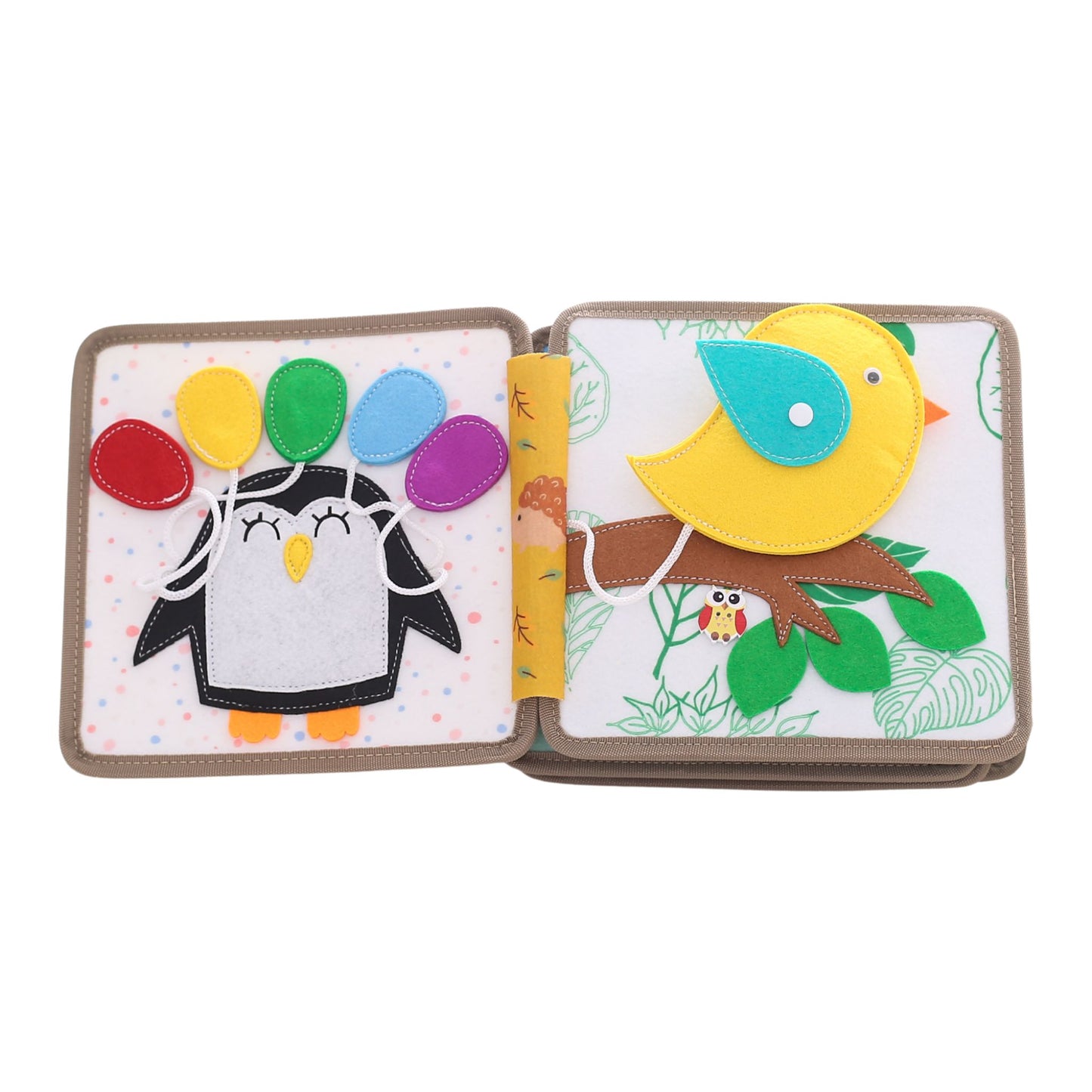 Busy book page with penguin balloons and yellow bird sensory activity