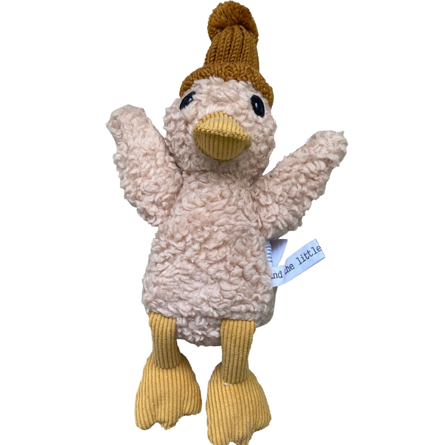 Cotton plush duck toy wearing mustard merino knit beanie on white background – Mamutino