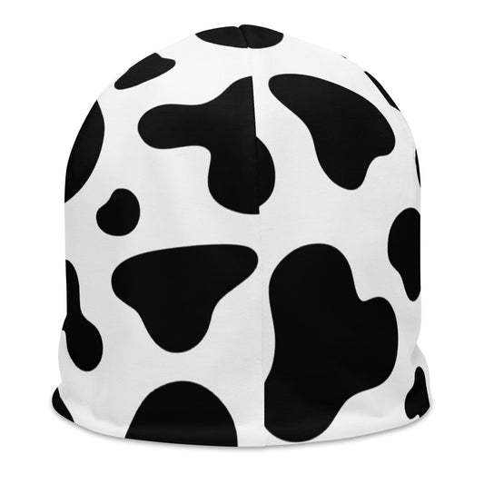 Unisex cow print beanie hat in black and white, soft double-layer knit, back view