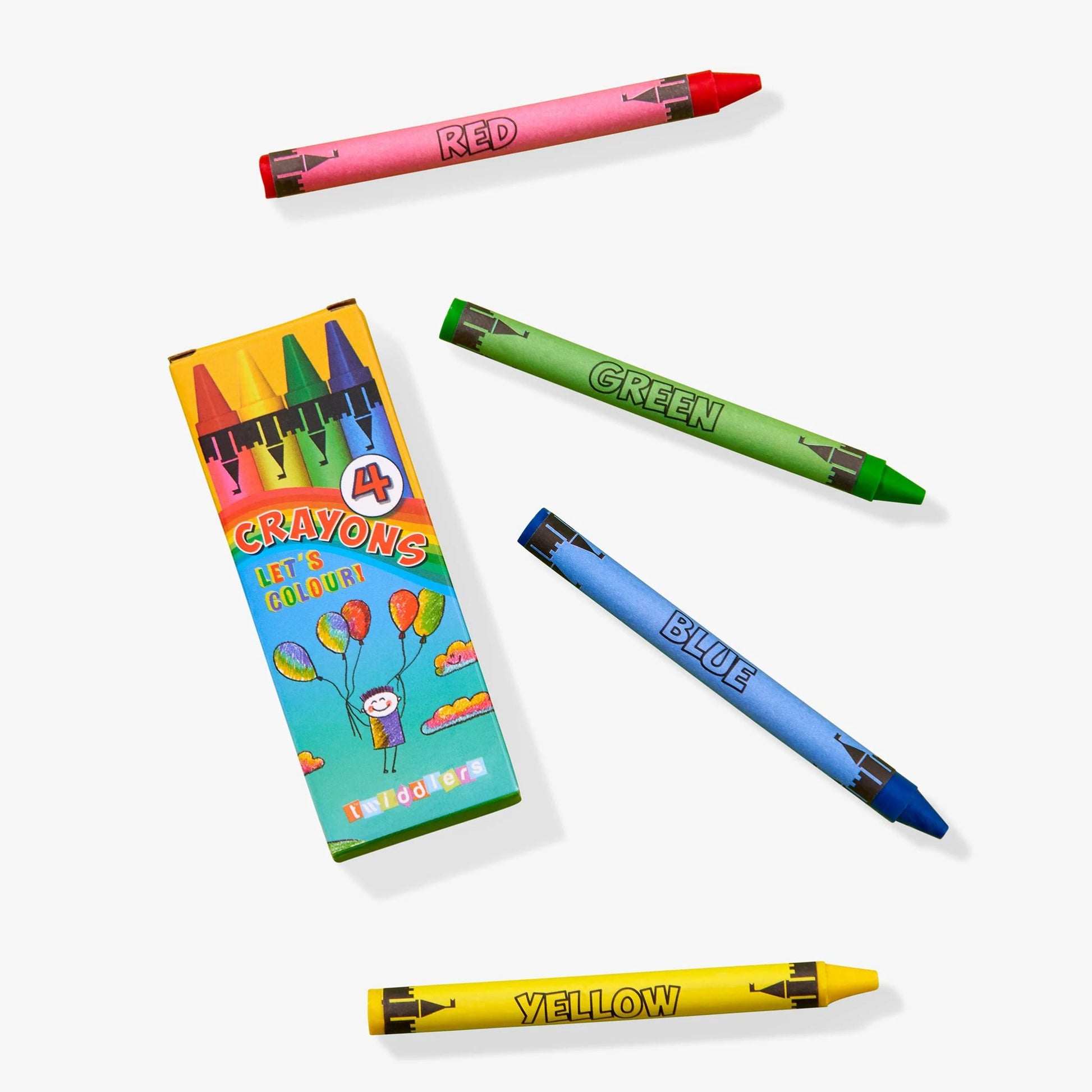 Box of crayons and 4 colourful crayons on white background