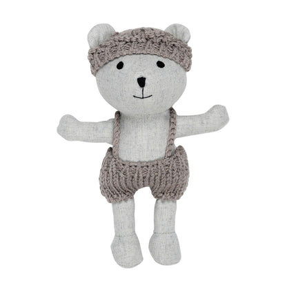 Mini plush teddy bear with knitted wool overalls and matching hat on white background – Mamutino