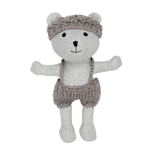 Mini plush teddy bear with knitted wool overalls and matching hat on white background – Mamutino
