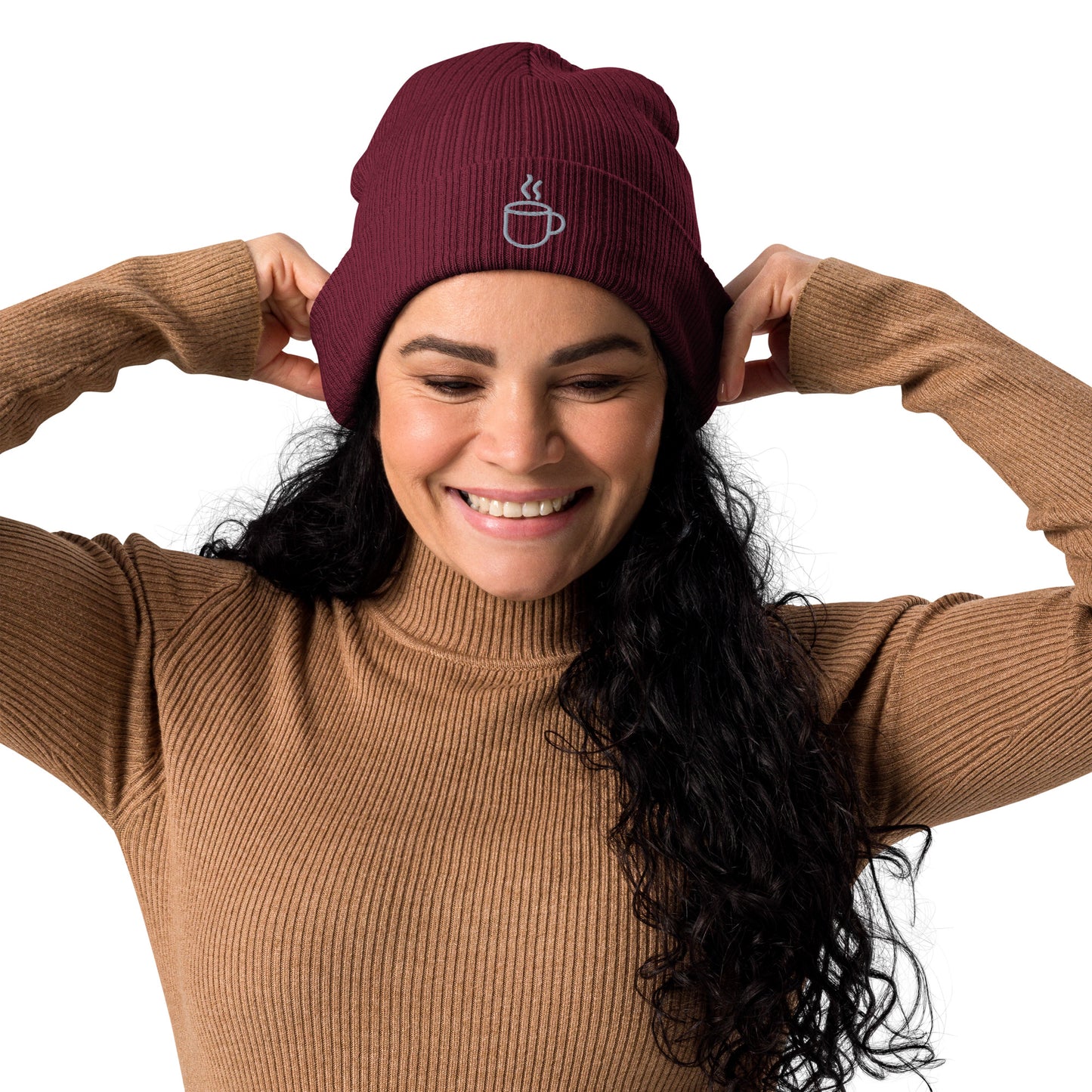 Model wearing ribbed knit beanie hat in burgundy with embroidered coffee cup design, front view