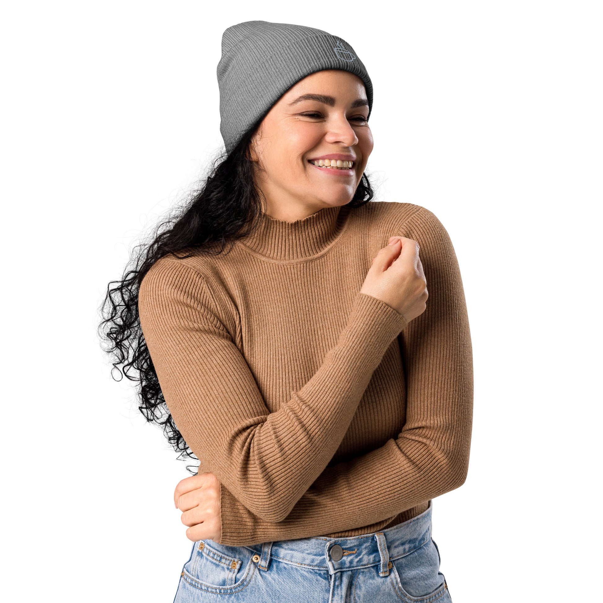 Model wearing ribbed knit beanie hat in light grey with embroidered coffee cup design, side view