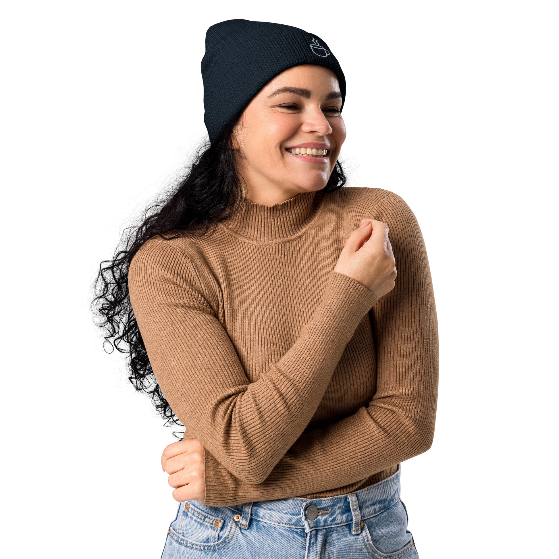 Model wearing ribbed knit beanie hat in oxford navy with embroidered coffee cup design, side view