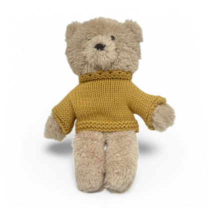 Soft vanilla plush teddy bear wearing mustard merino knit jumper on white background – Mamutino